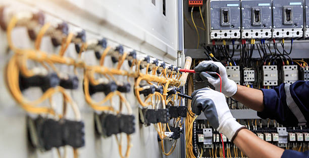 Professional Electrician technician working in Waukomis, OK